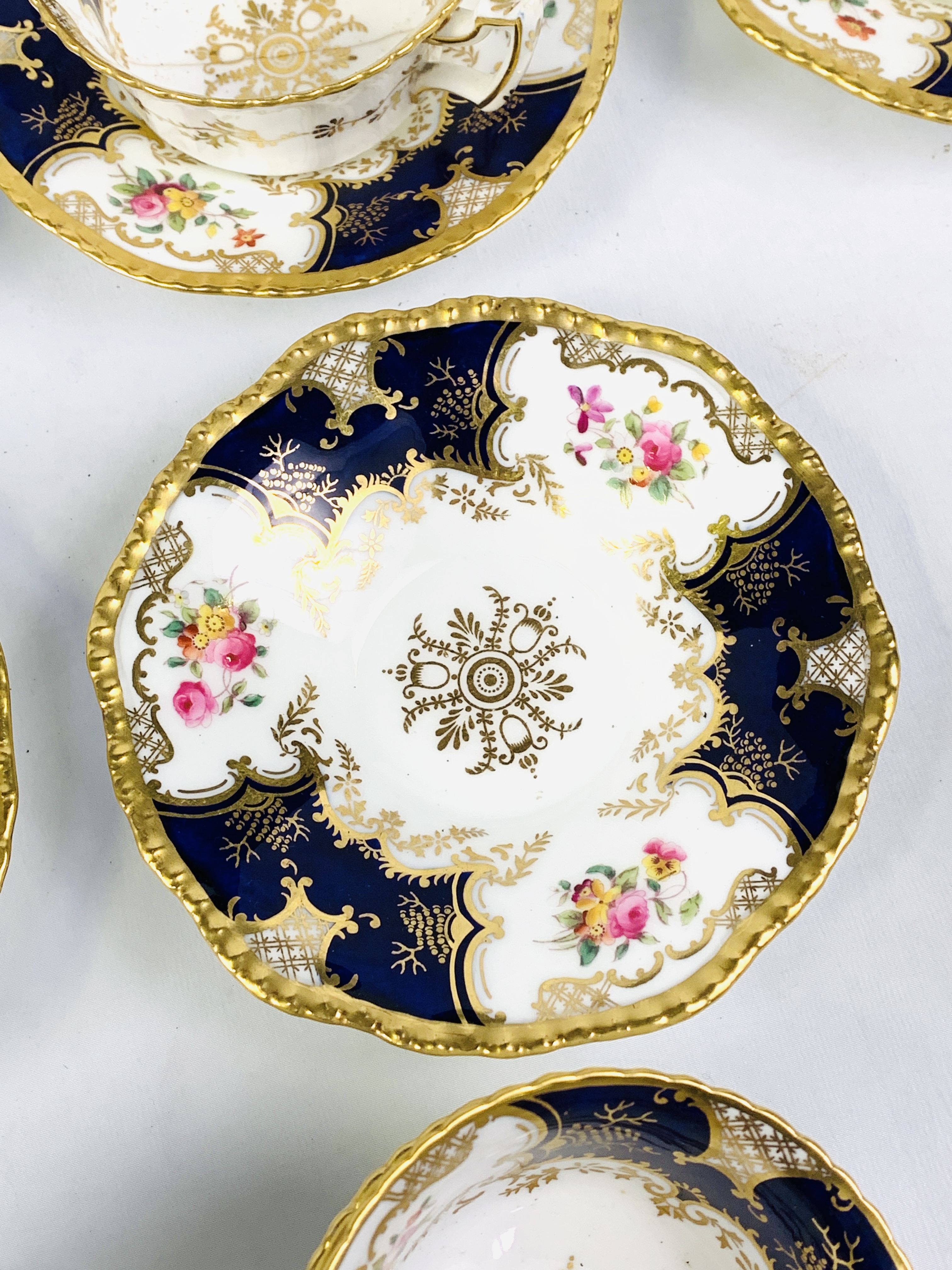 Eleven blue and gold hand painted Coalport cups and saucers - Image 5 of 6