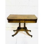 Mahogany fold over swivel top card table.