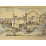 Framed and glazed watercolour of Mousemole, Cornwall, signed T H Victor.