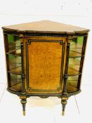 Walnut and ormolu partially glazed corner cabinet.