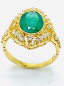 18ct gold, emerald and diamond ring.