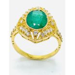 18ct gold, emerald and diamond ring.