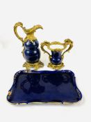 A 19th century French cobalt blue porcelain and bronze ormolu ewer and vase.