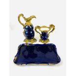 A 19th century French cobalt blue porcelain and bronze ormolu ewer and vase.