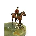 Green onyx ashtray, mounted with a cold painted bronze figure of a huntsman with hounds