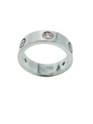 18ct white gold Cartier love ring, set with diamonds.