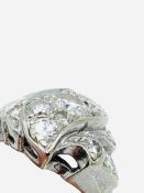 14ct white gold serpentine set diamond ring.