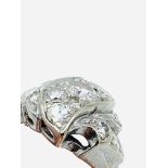 14ct white gold serpentine set diamond ring.