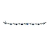 18ct white gold and graduated sapphire twisted bracelet.