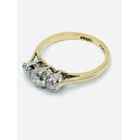 18ct gold, platinum set diamond trilogy ring.