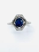 Art Deco style platinum, sapphire and diamond cluster ring.