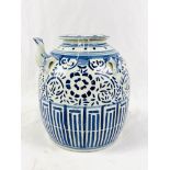 Large blue and white Oriental style jar with spout