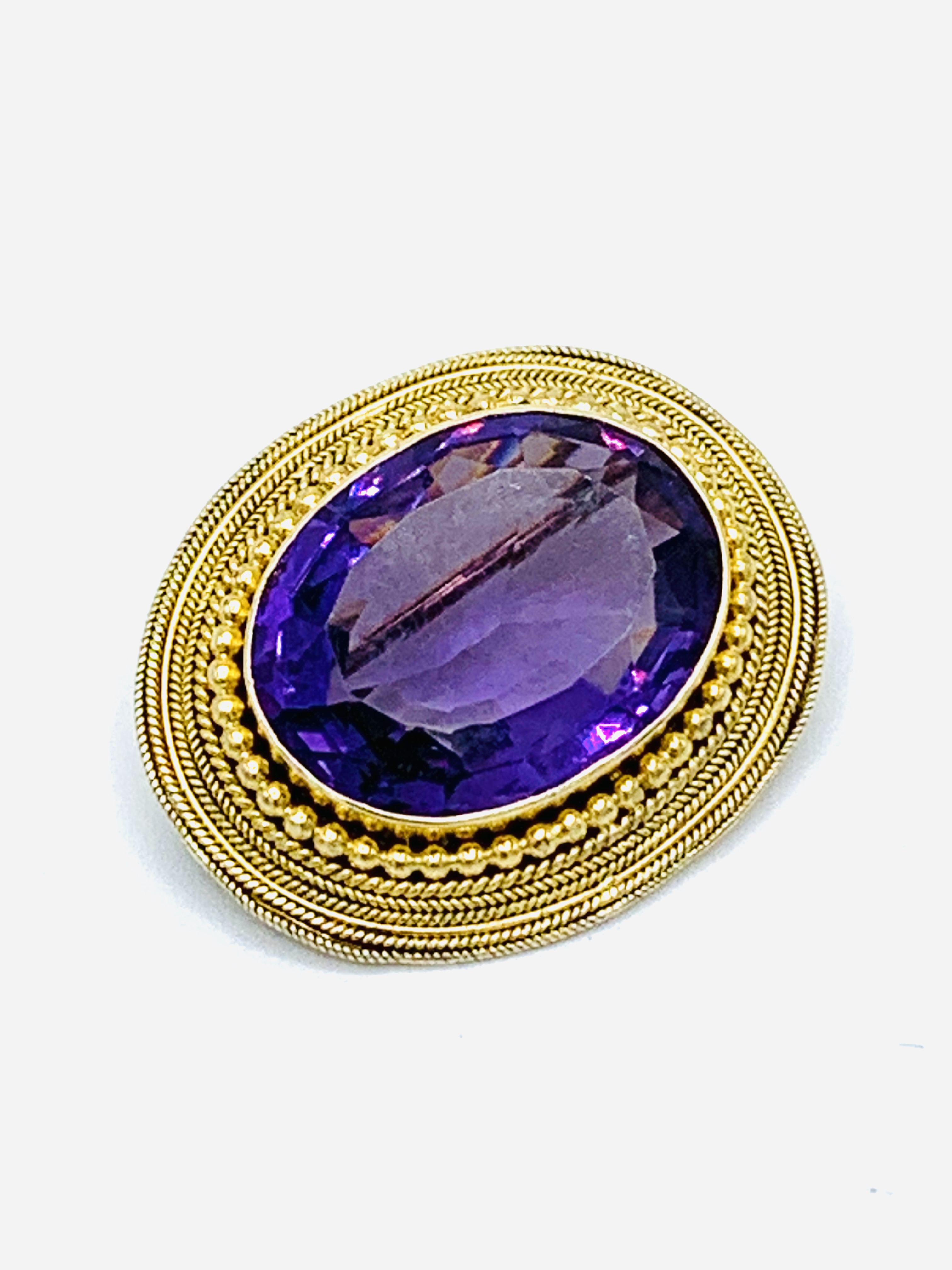Late 19th century 14ct gold mounted amethyst brooch.