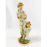 Large decorative porcelain figurine of a woman