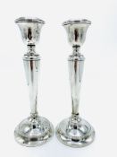 Pair of silver candlesticks.