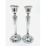 Pair of silver candlesticks.