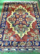 Dark red and blue ground wool carpet