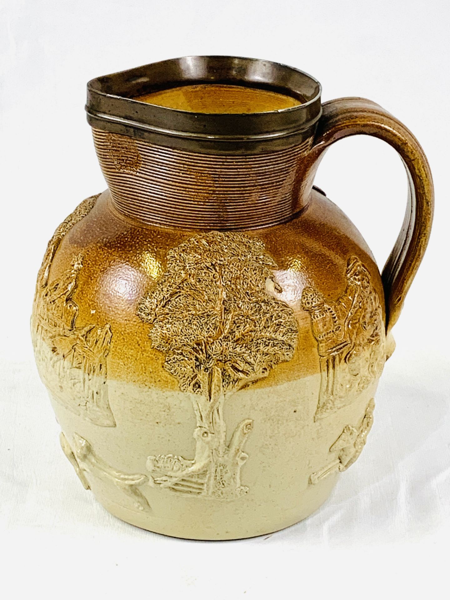 A Mortlake salt glazed stoneware jug.
