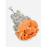 18ct white gold and floral carved coral pendant.