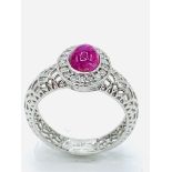 18ct white gold and Burmese ruby diamond set filigree ring.