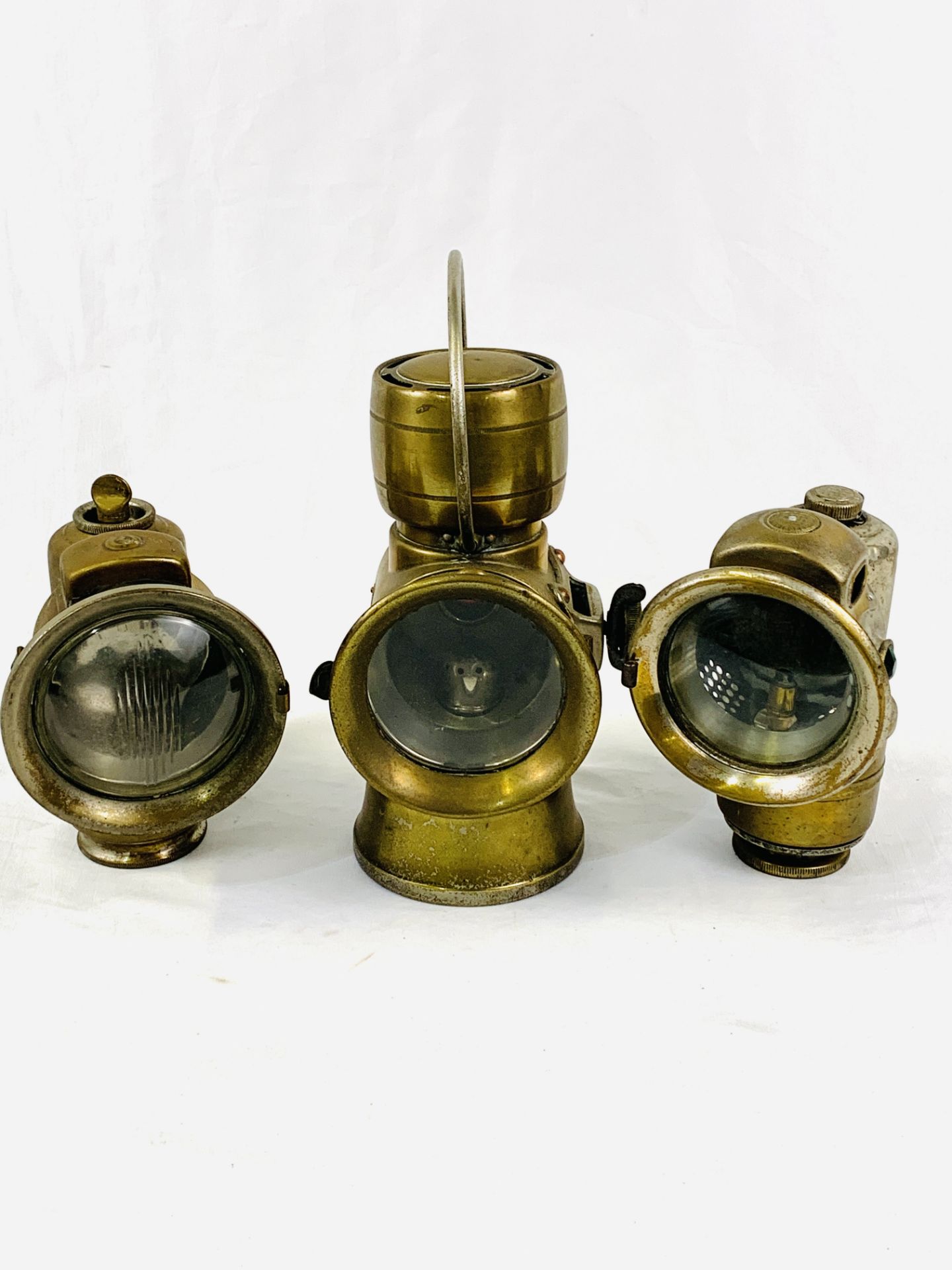 Three carbide vehicle lamps