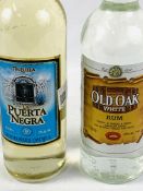 One litre bottle of Tequila, and one litre bottle of old oak white rum