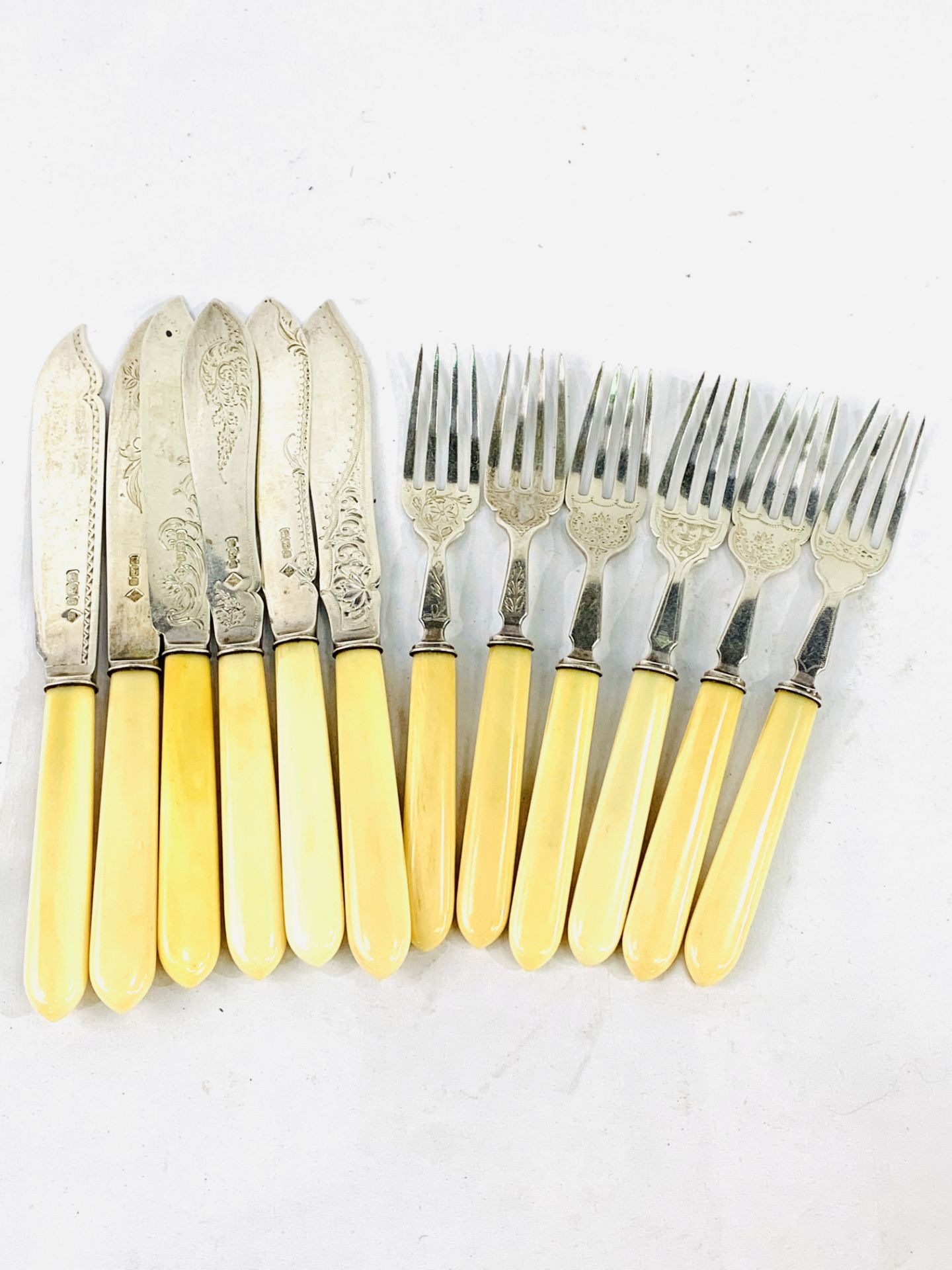 A Harlequin set of 6 pairs of mid-Victorian hallmarked silver and bone handled fish knives and forks