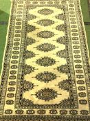 Beige ground rug