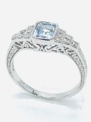 18ct white gold, aquamarine and diamond ring.