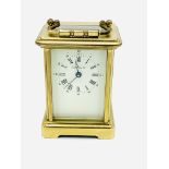 Brass cased carriage clock by The London Clock Company
