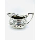 Large silver creamer and sugar bowl