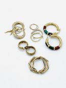 Seven pairs of 9ct gold hoop earrings