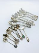 Georgian silver fork; 3 continental silver spoons; an 800 silver baby's pusher; and others.