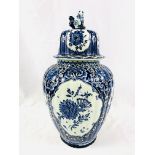Large blue and white ginger jar, with domed lid and dog finial