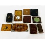 A number of crocodile skin wallets and cases, and other items