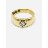 18ct gold flush set diamond solitaire ring