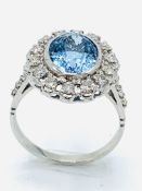 18ct white gold aquamarine and diamond set ring.
