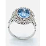 18ct white gold aquamarine and diamond set ring.