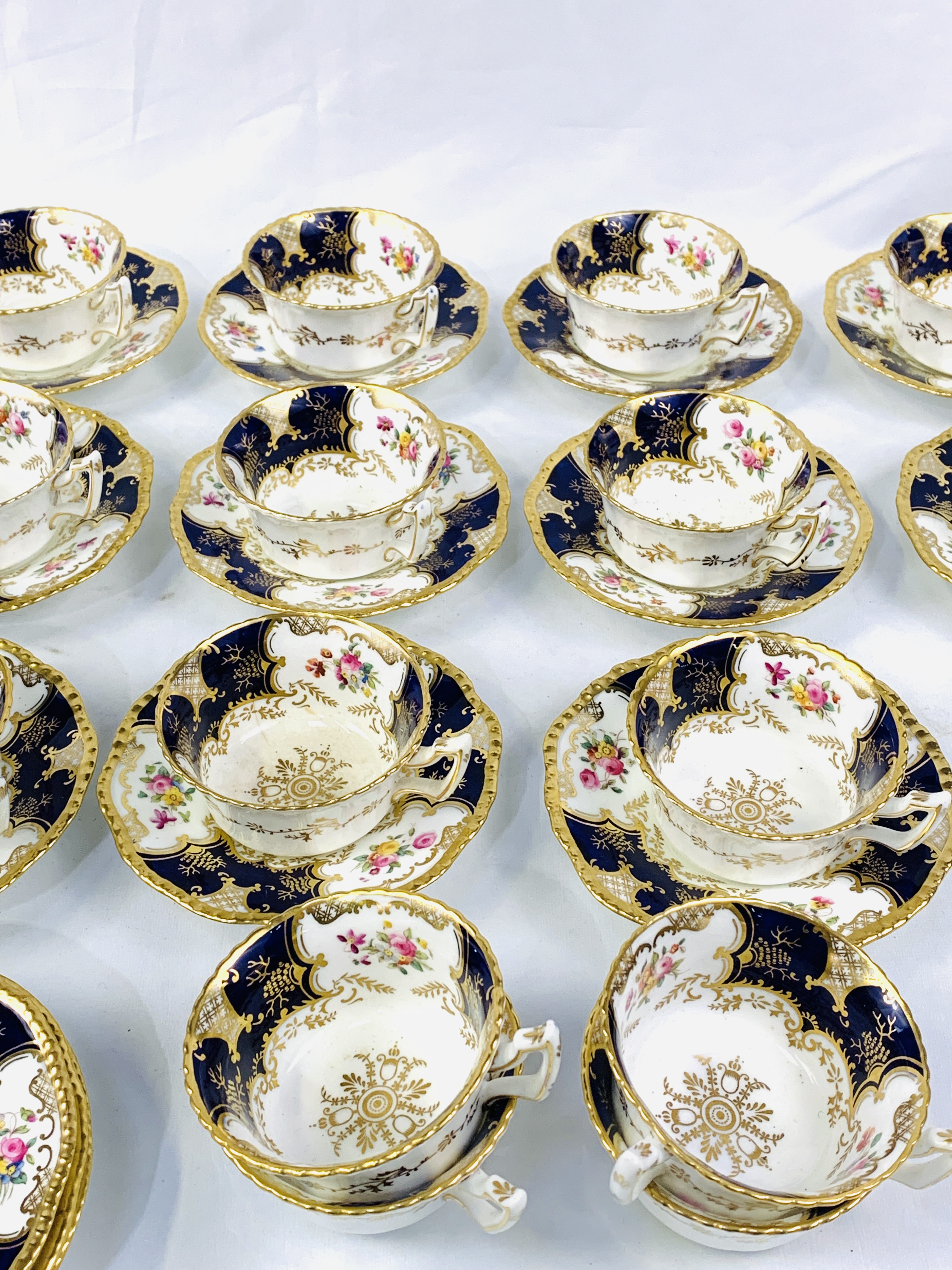 Eleven blue and gold hand painted Coalport cups and saucers - Image 2 of 6