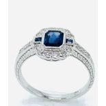 18ct white gold, sapphire and diamond ring.