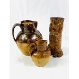 Two salt glazed stoneware jugs and a salt glazed dog figure