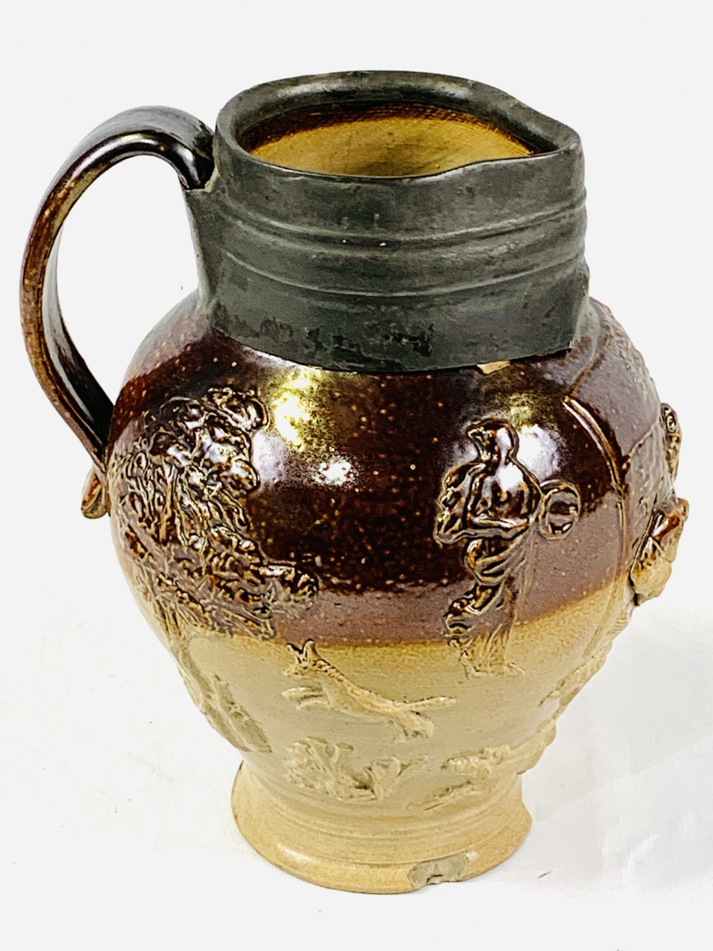 A Georgian Mortlake Kishere salt glazed stoneware jug.