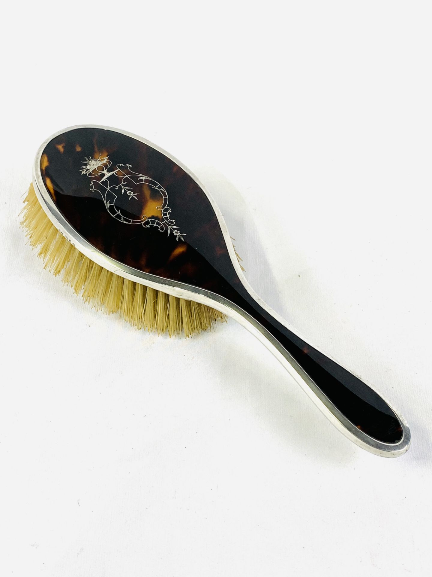 Edwardian tortoiseshell and hallmarked silver mounted and silver inlaid hairbrush