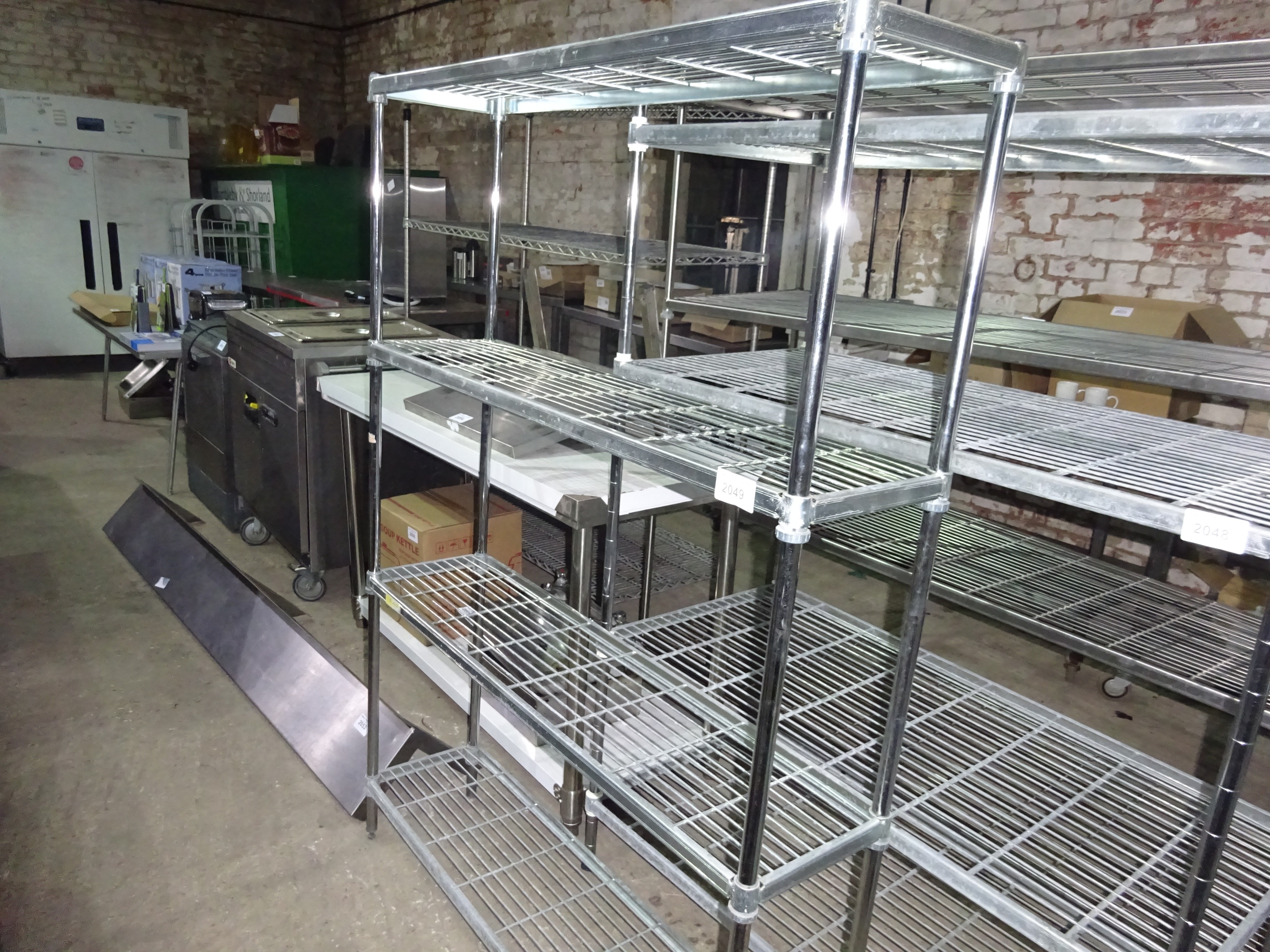 Four tier wire rack, width 120cms, depth 30cms and height 170cms.