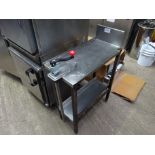 Stainless steel prep table with undershelf and can opener W: 34cms, D:68 cms, H: 100cms
