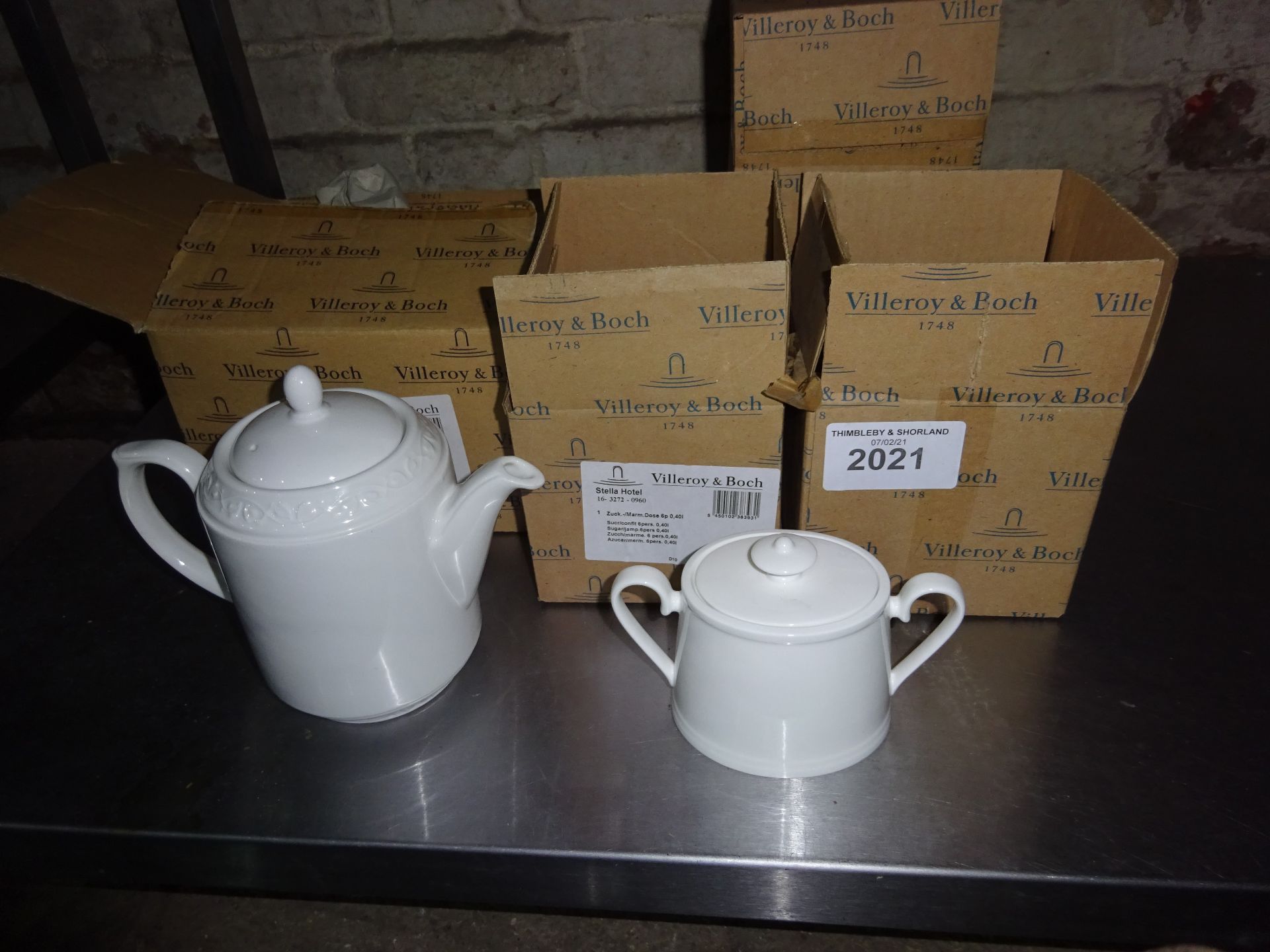 Five Villeroy & Boch china sugar pots and one china teapot.