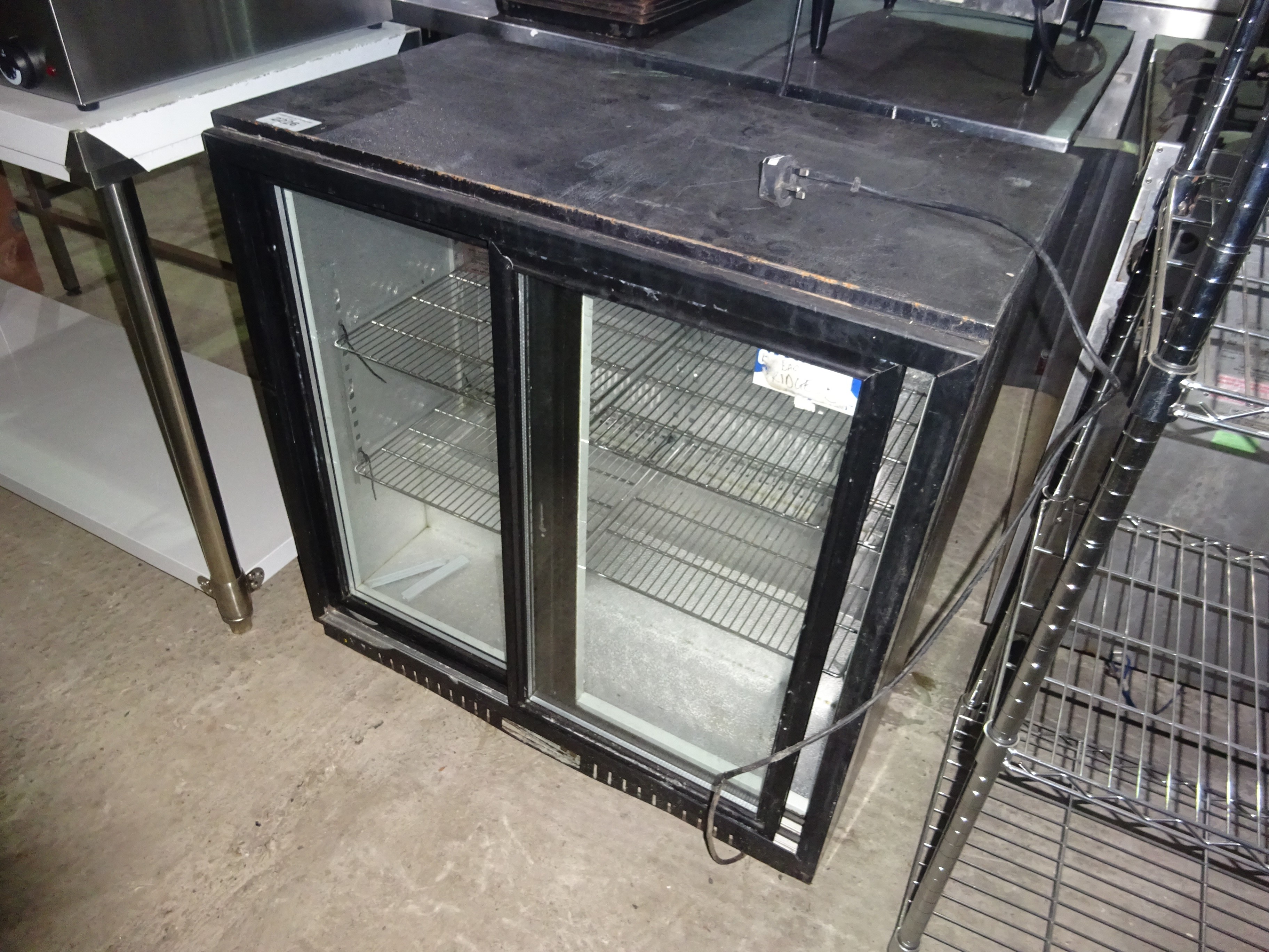 2-door under counter bottle fridge. W: 90cms, D:51cms, H:91cms