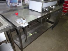 Stainless steel prep table with drawer, shelf and tin opener.