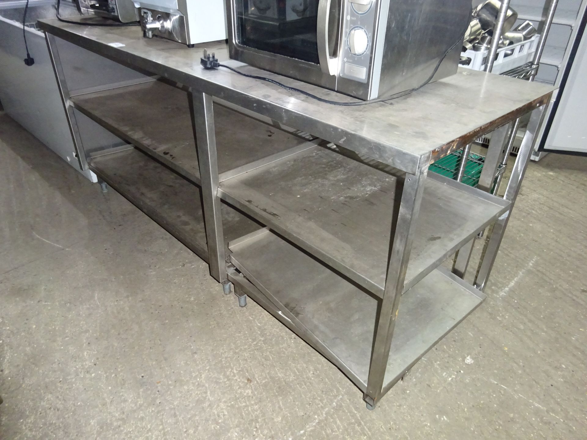 Stainless steel 3 tier prep table with centre holes, width 205cms, depth 72cms and height 92cms.