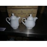 Eight Villeroy & Boch china teapots.